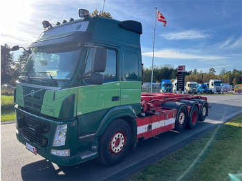 Skip loader truck Volvo FM500 8x2*6 rigid pusher-tag tridem: picture 3