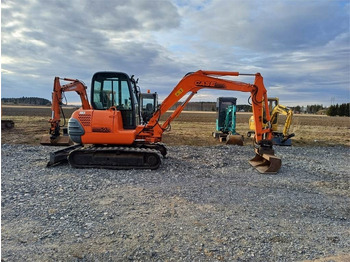 Mini excavator Case CX50 kallistajalla: picture 5