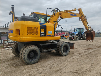Wheel excavator Komatsu PW140-7: picture 3