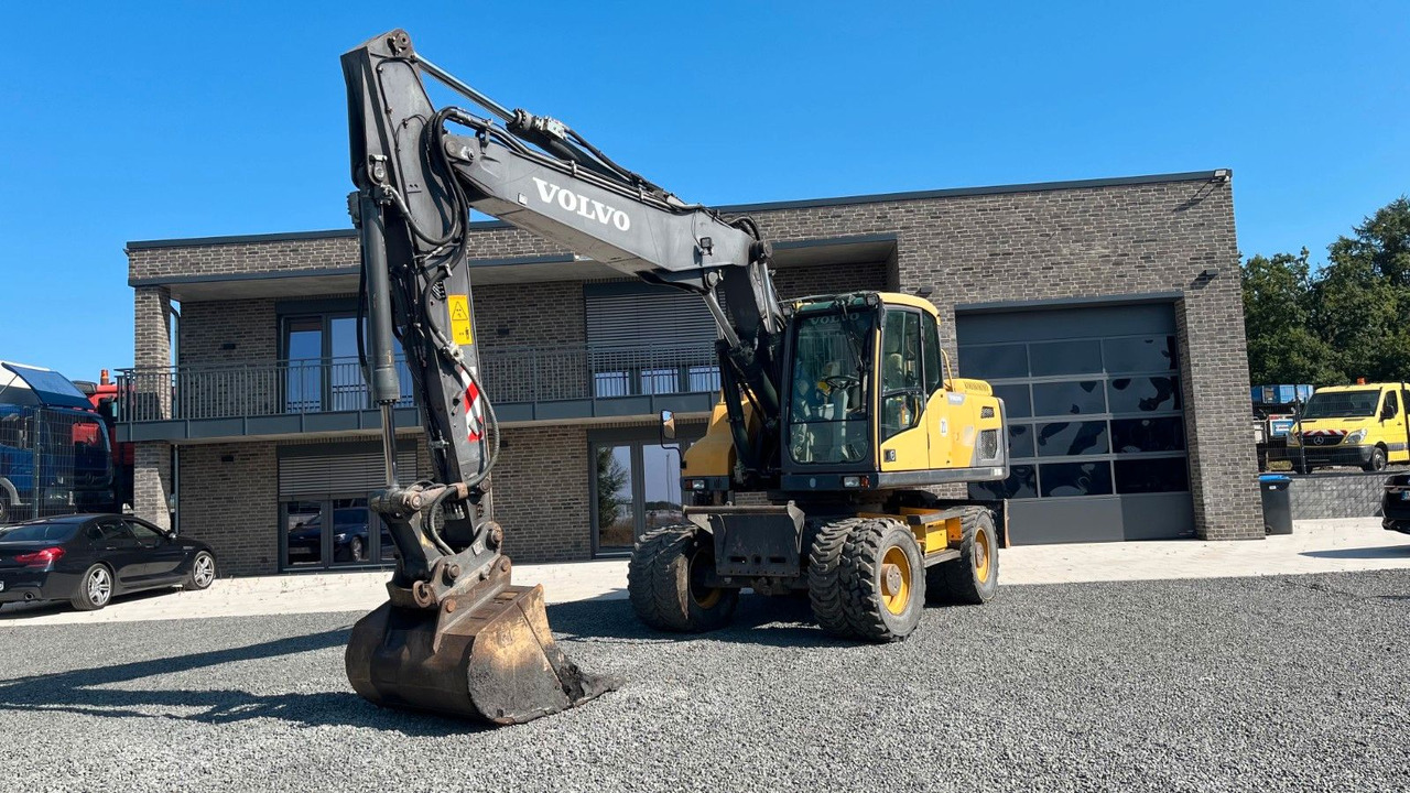 Volvo EW180D 20500 Kg Verstellausleger OilQuick - Wheel excavator: picture 1 Volvo EW180D 20500 Kg Verstellausleger OilQuick - Wheel excavator: picture 1