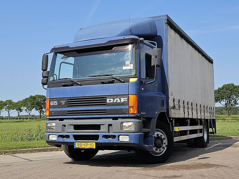DAF 65.180 MANUAL NL-TRUCK - Curtainsider truck: picture 1 DAF 65.180 MANUAL NL-TRUCK - Curtainsider truck: picture 1