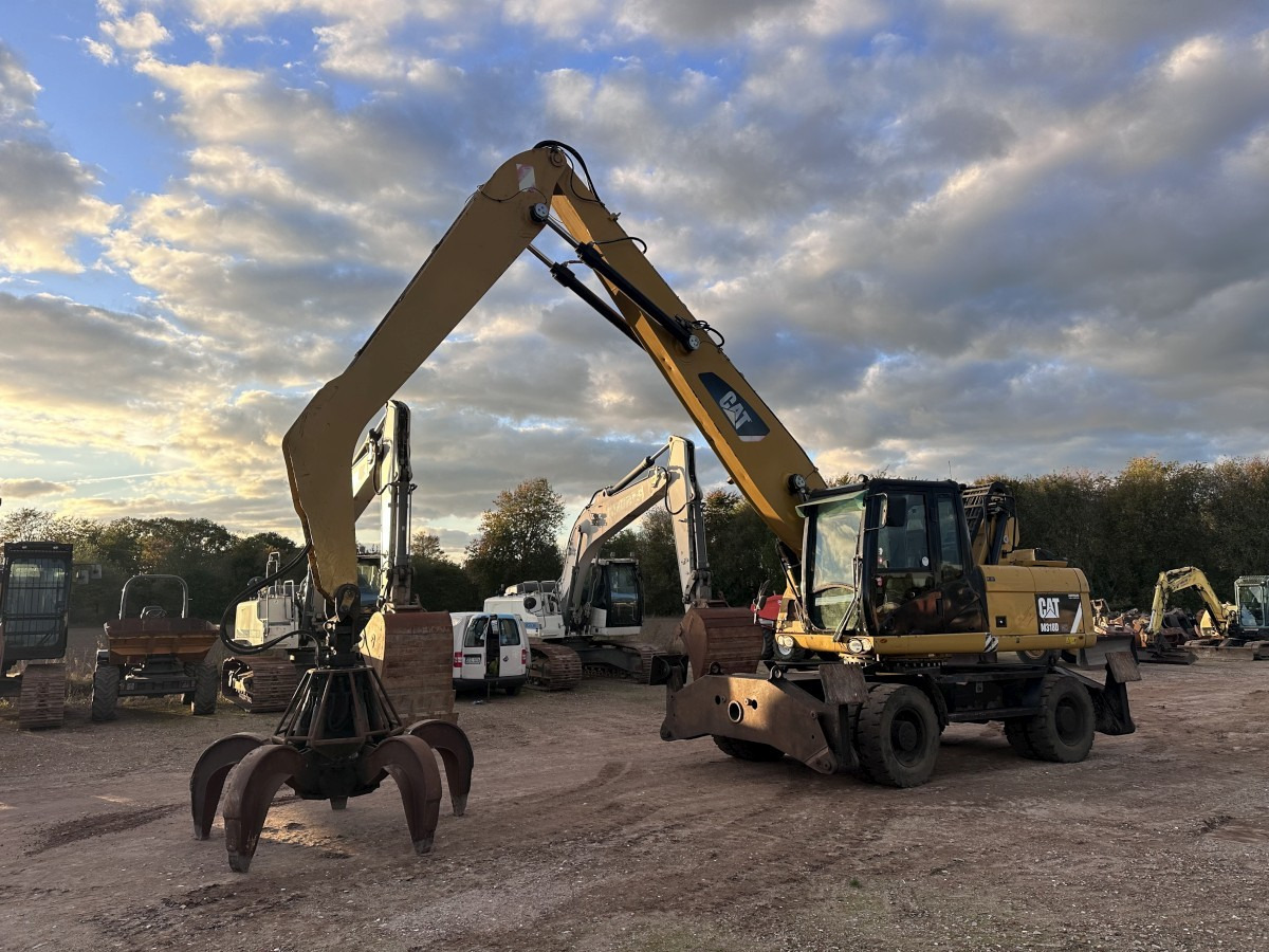 CATERPILLAR M 318 MH mit Greifer Kein 3022 3026 320 322 - Waste/ Industry handler: picture 1 CATERPILLAR M 318 MH mit Greifer Kein 3022 3026 320 322 - Waste/ Industry handler: picture 1