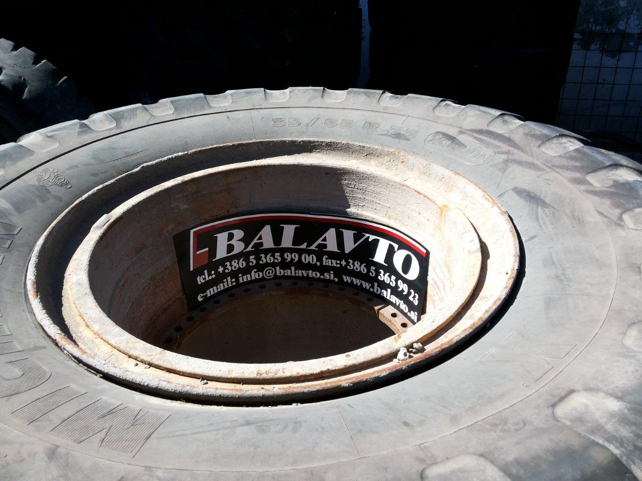 Caterpillar 988B - Wheel and tire package for Construction machinery: picture 1 Caterpillar 988B - Wheel and tire package for Construction machinery: picture 1