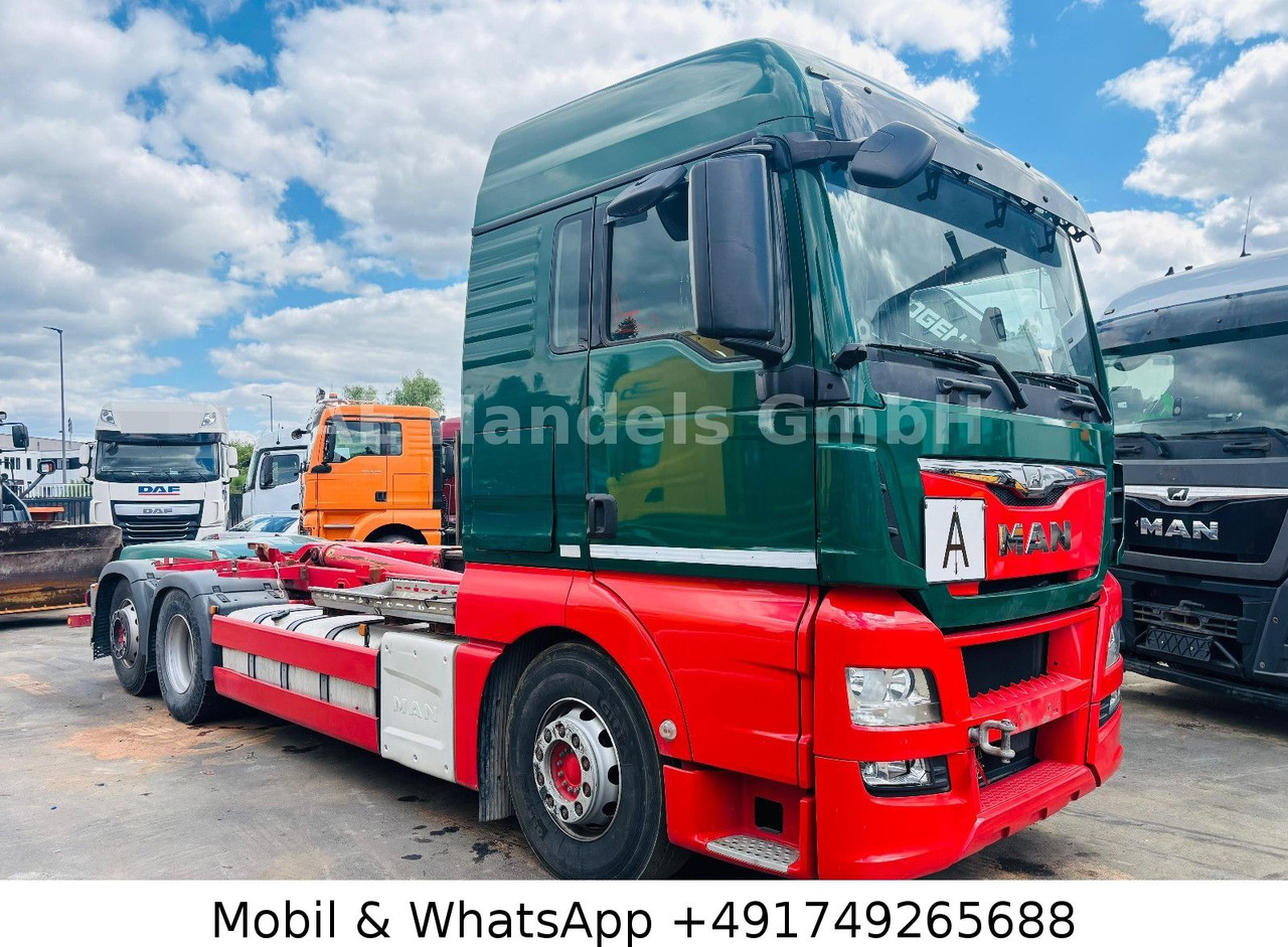 MAN TGX 26.440 XLX BL 6x2 *Retarder/MEILLER-RK-20.65 - Hook lift truck, Crane truck: picture 1 MAN TGX 26.440 XLX BL 6x2 *Retarder/MEILLER-RK-20.65 - Hook lift truck, Crane truck: picture 1