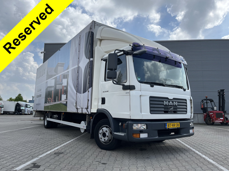 MAN TGL 12.180 Euro 4 / 12 Ton / 781 dkm / Canvas Box / APK TUV 10-25 - Box truck: picture 1 MAN TGL 12.180 Euro 4 / 12 Ton / 781 dkm / Canvas Box / APK TUV 10-25 - Box truck: picture 1