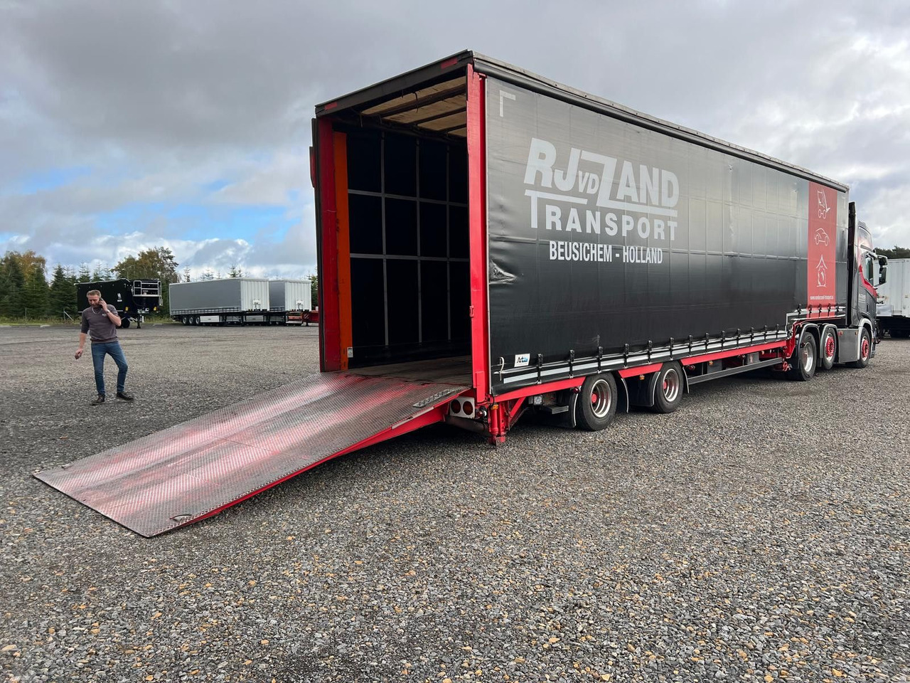 Meusburger 2-Achs-Gabelstaplertransporter Rampe Dhollandia - Low loader semi-trailer: picture 1 Meusburger 2-Achs-Gabelstaplertransporter Rampe Dhollandia - Low loader semi-trailer: picture 1