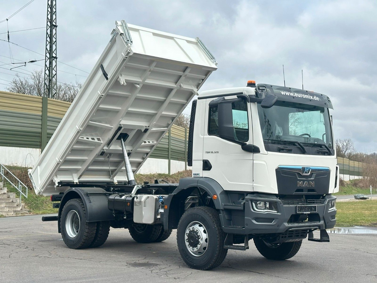 Lease a  MAN TGM 18.320  4X4  Euro 6e Euromix 3-Seiten-Kipper MAN TGM 18.320  4X4  Euro 6e Euromix 3-Seiten-Kipper: picture 16