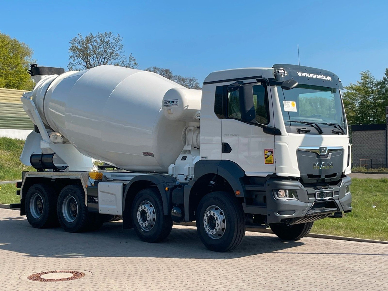 MAN TGS 35.520 8x4 /Euro6e EuromixMTP EM 10 L - Concrete mixer truck: picture 1 MAN TGS 35.520 8x4 /Euro6e EuromixMTP EM 10 L - Concrete mixer truck: picture 1