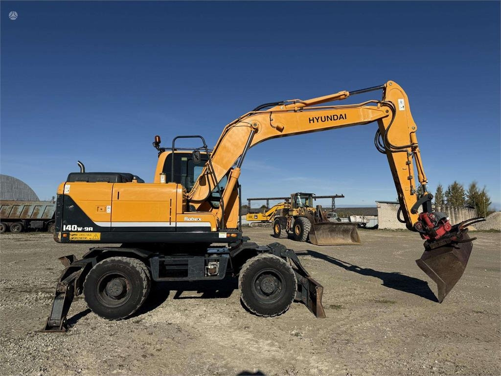 Hyundai Robex 140 W-9A Rototilt + grap - Wheel excavator: picture 5 Hyundai Robex 140 W-9A Rototilt + grap - Wheel excavator: picture 5