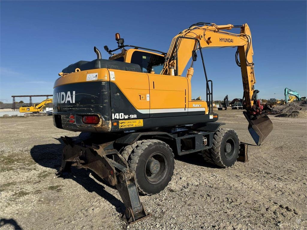 Hyundai Robex 140 W-9A Rototilt + grap - Wheel excavator: picture 4 Hyundai Robex 140 W-9A Rototilt + grap - Wheel excavator: picture 4
