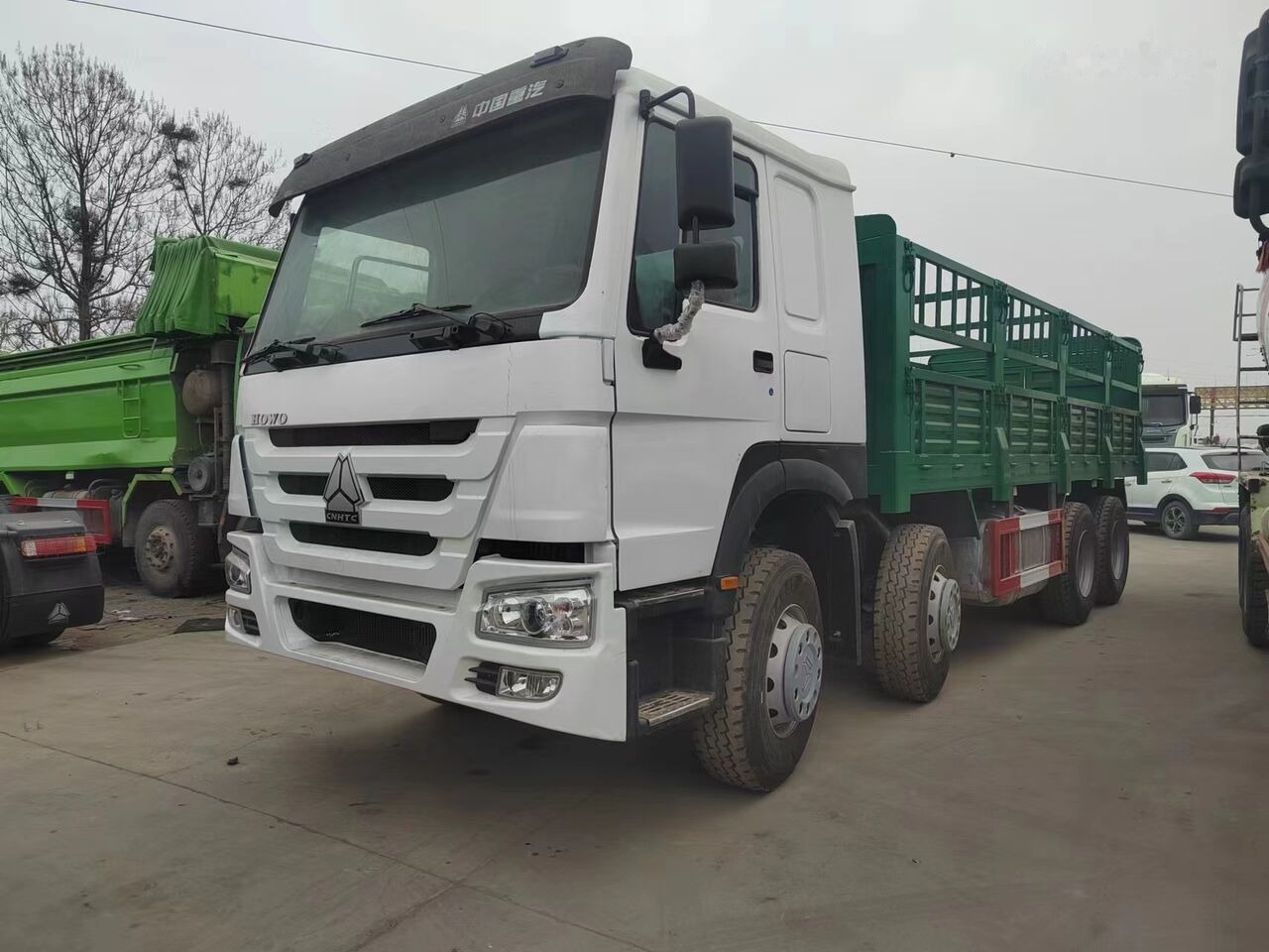 Sinotruk HOWO 8*4 Fence Truck - Dropside/ Flatbed truck: picture 1 Sinotruk HOWO 8*4 Fence Truck - Dropside/ Flatbed truck: picture 1