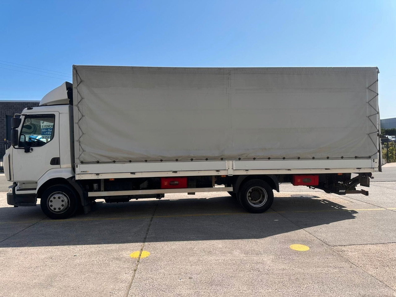 Renault Midlum dXi220-12. Klima. - Curtainsider truck: picture 1 Renault Midlum dXi220-12. Klima. - Curtainsider truck: picture 1