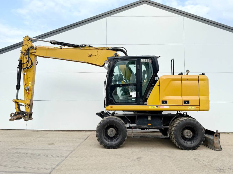 Cat M314 next gen - Triple Boom / Automatic Greasing - Wheel excavator: picture 1 Cat M314 next gen - Triple Boom / Automatic Greasing - Wheel excavator: picture 1