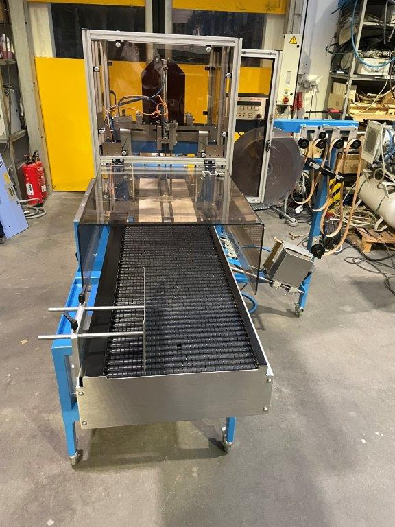 ATS Tanner UltraSonic US 2000-AB transit banding machine with pneumatic product hold-down and infeed roller table - Packaging machinery: picture 4 ATS Tanner UltraSonic US 2000-AB transit banding machine with pneumatic product hold-down and infeed roller table - Packaging machinery: picture 4