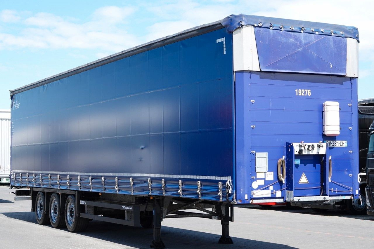 Schmitz Cargobull FIRANKA VARIOS / PODNOSZONY DACH / OPONY 385/55 - Curtainsider semi-trailer: picture 4 Schmitz Cargobull FIRANKA VARIOS / PODNOSZONY DACH / OPONY 385/55 - Curtainsider semi-trailer: picture 4
