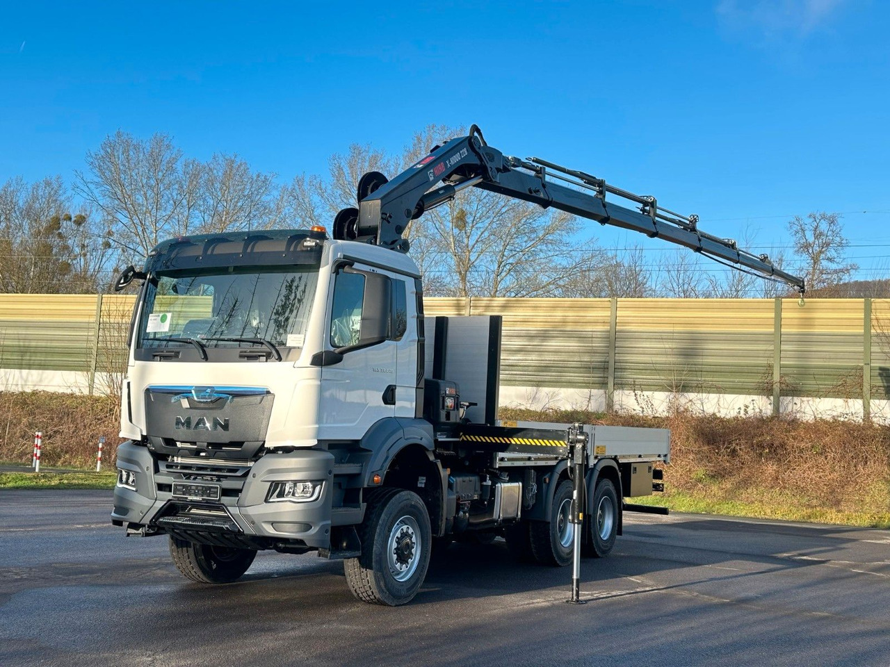 MAN TGS 33.440 6x6 Kran HIAB 228-6 - Dropside/ Flatbed truck, Crane truck: picture 2 MAN TGS 33.440 6x6 Kran HIAB 228-6 - Dropside/ Flatbed truck, Crane truck: picture 2