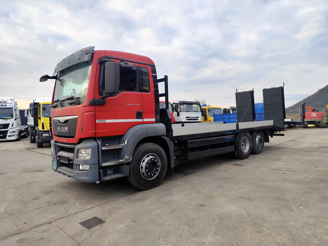 MAN TGS 26.440 - Dropside/ Flatbed truck: picture 1 MAN TGS 26.440 - Dropside/ Flatbed truck: picture 1