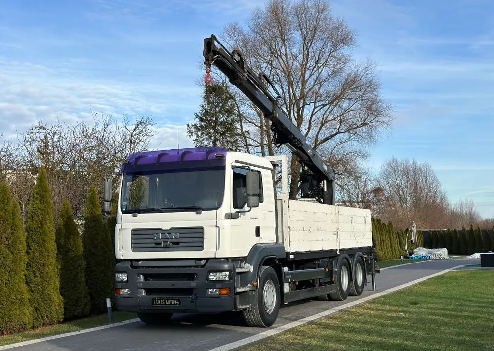 MAN TGA 24.410 6x4 HIAB MANUAL - Dropside/ Flatbed truck, Crane truck: picture 1 MAN TGA 24.410 6x4 HIAB MANUAL - Dropside/ Flatbed truck, Crane truck: picture 1