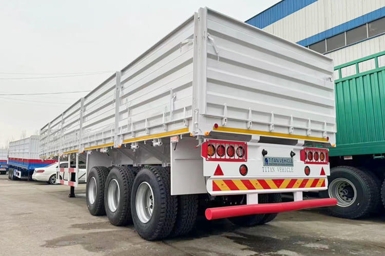 TITAN Side Wall Trailer for Sale in Zambia - Dropside/ Flatbed semi-trailer: picture 1 TITAN Side Wall Trailer for Sale in Zambia - Dropside/ Flatbed semi-trailer: picture 1