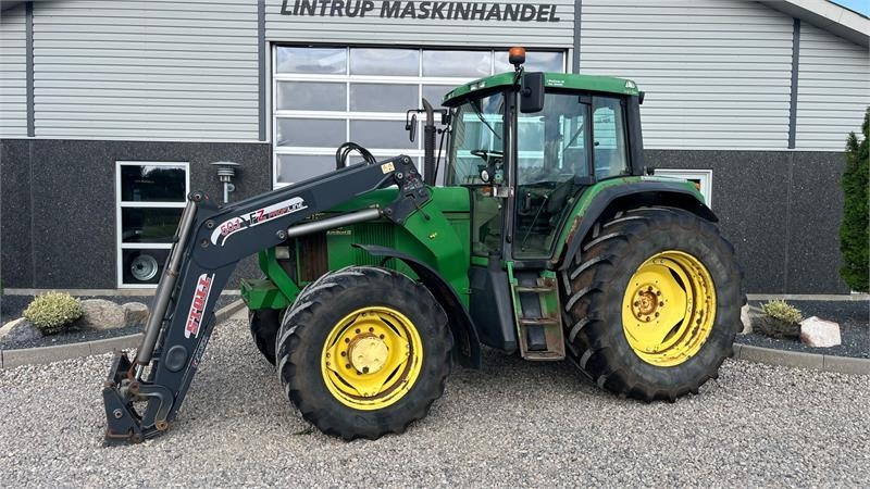 John Deere 6910 Auto Quad II-TLS Med frontlæsser - Farm tractor: picture 1 John Deere 6910 Auto Quad II-TLS Med frontlæsser - Farm tractor: picture 1