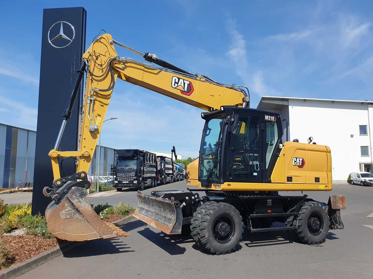 CAT M318 / 2022 / nur 286h! / Tieflöffel / Pratzen - Wheel excavator: picture 1 CAT M318 / 2022 / nur 286h! / Tieflöffel / Pratzen - Wheel excavator: picture 1