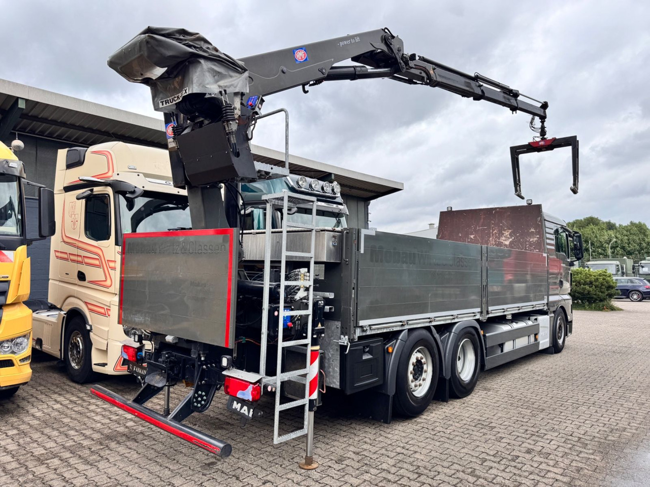MAN 26.460 TGX Baustoffkran HMF 2110-L3 - Crane truck: picture 5 MAN 26.460 TGX Baustoffkran HMF 2110-L3 - Crane truck: picture 5